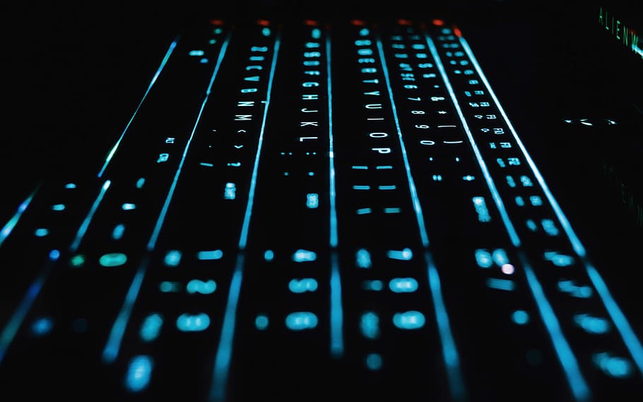 computer mechanical keyboard with blue LED light, shallow focus photography of keyboard HD wallpaper