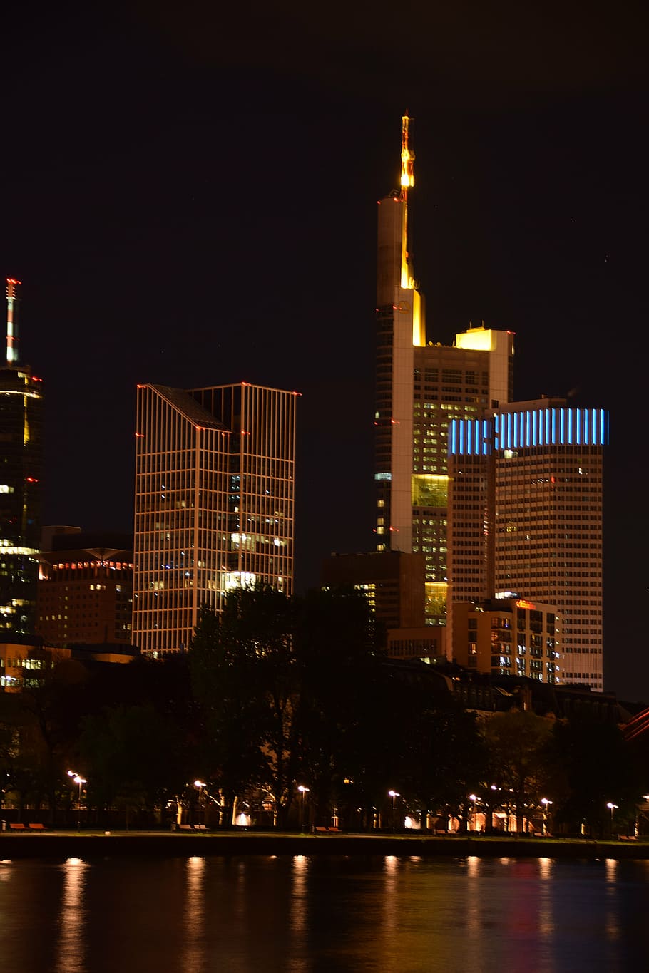 skyline, night, skyscraper, water, water surface, reflection HD wallpaper