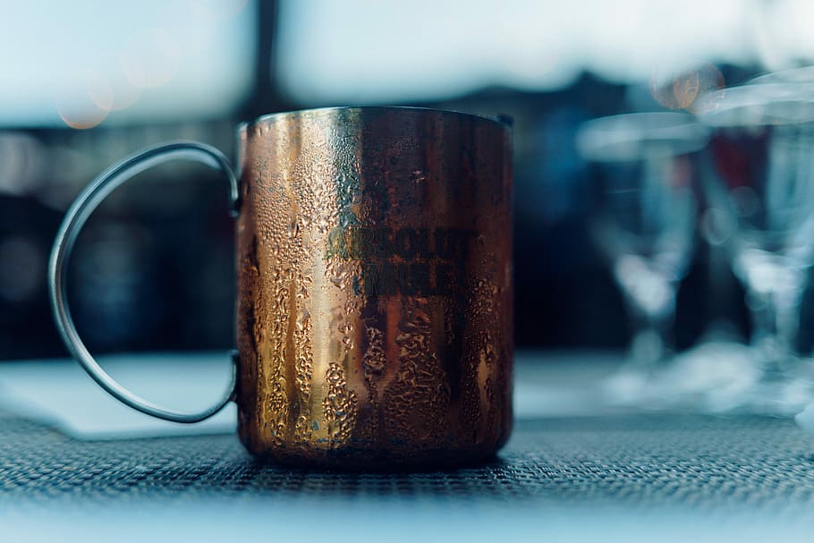 selective focus photo of copper-colored mug with water moist, focus photography of brown metal mug, HD wallpaper