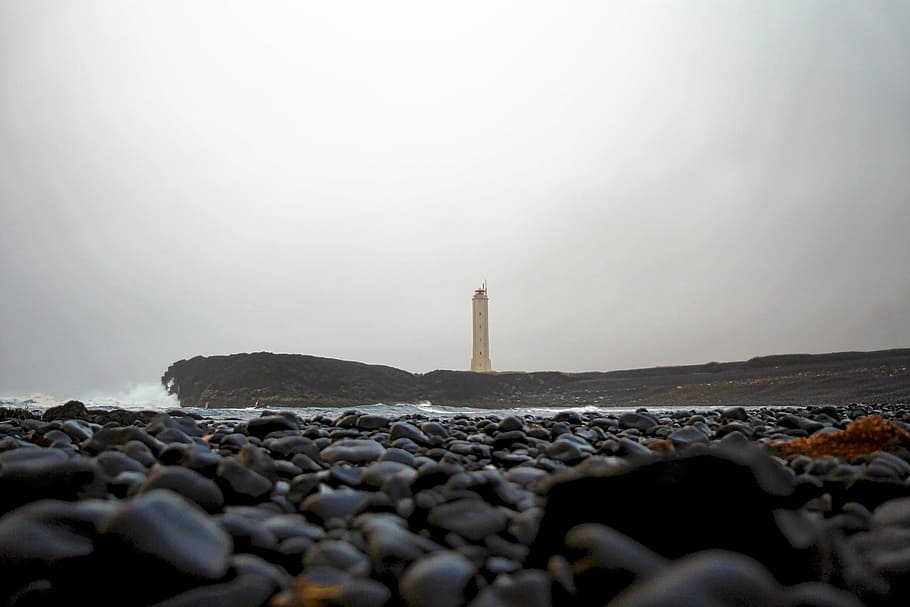 beach, coast, landscape, lighthouse, ocean, outdoors, pebbles HD wallpaper