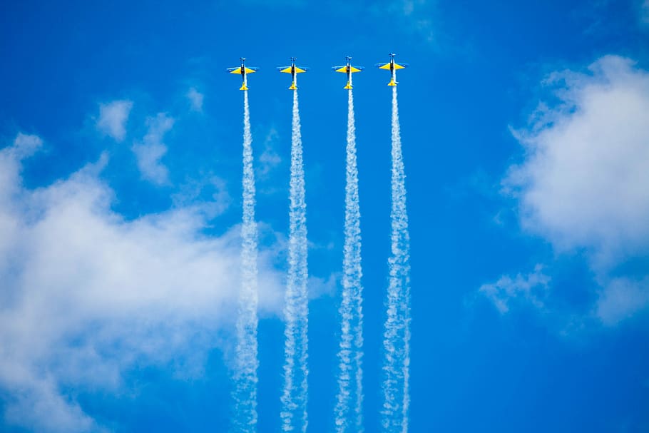 four stunt planes during daytime, four on flights plane bursting speed HD wallpaper