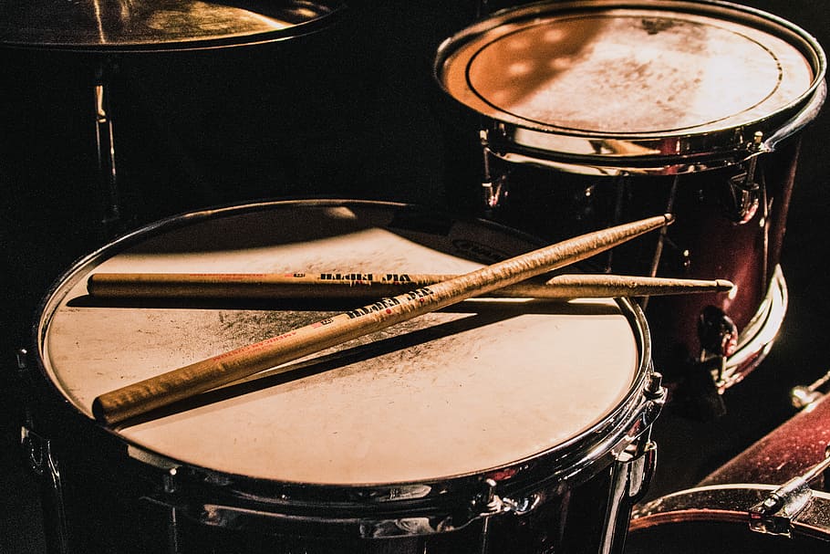 pair of brown wooden drumsticks on top of white and gray musical drum, two red snare drums with drum sticks, HD wallpaper