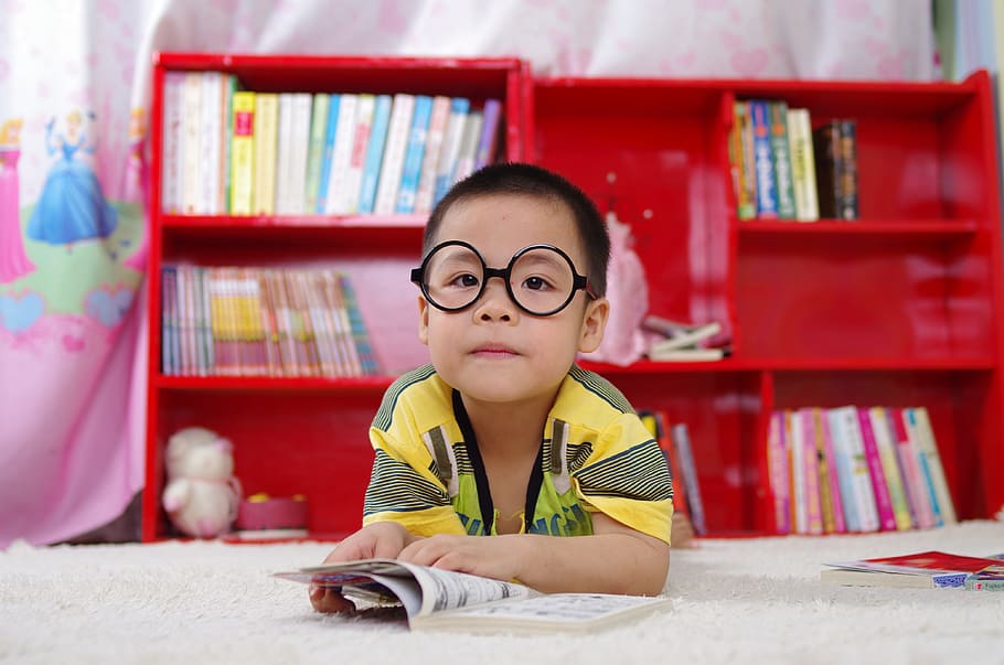boy's yellow and black shirt, reading, book, glasses, books HD wallpaper