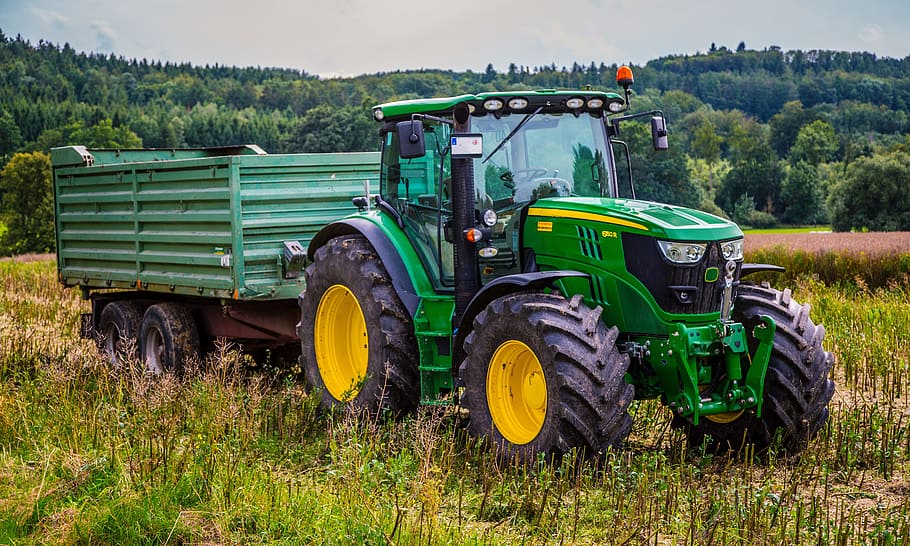 selective focus photography of green tractor, agricultural machine