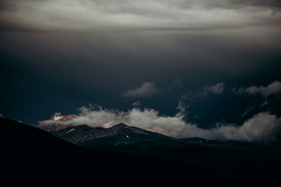 mountain covered with fog during daytime, aerial view of mountain and clouds during daytime HD wallpaper