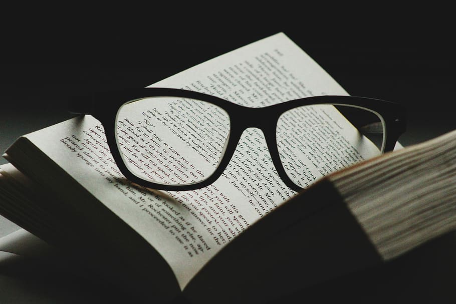 black framed eyeglasses on top of open book, eyeglasses with black frames on open book, HD wallpaper
