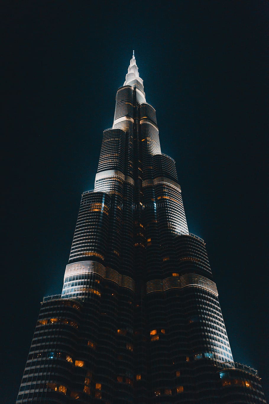 black and gray concrete building low angle photography, grey concrete building during night time HD wallpaper