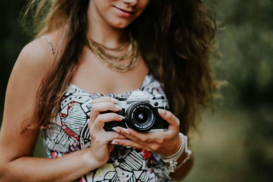 Woman in a dress with a camera, girl, young, photographer, beautiful