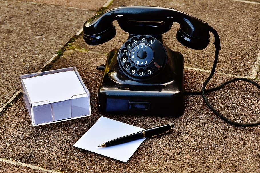 rotary phone on ground beside pen and sticky note, old, year built 1955 HD wallpaper