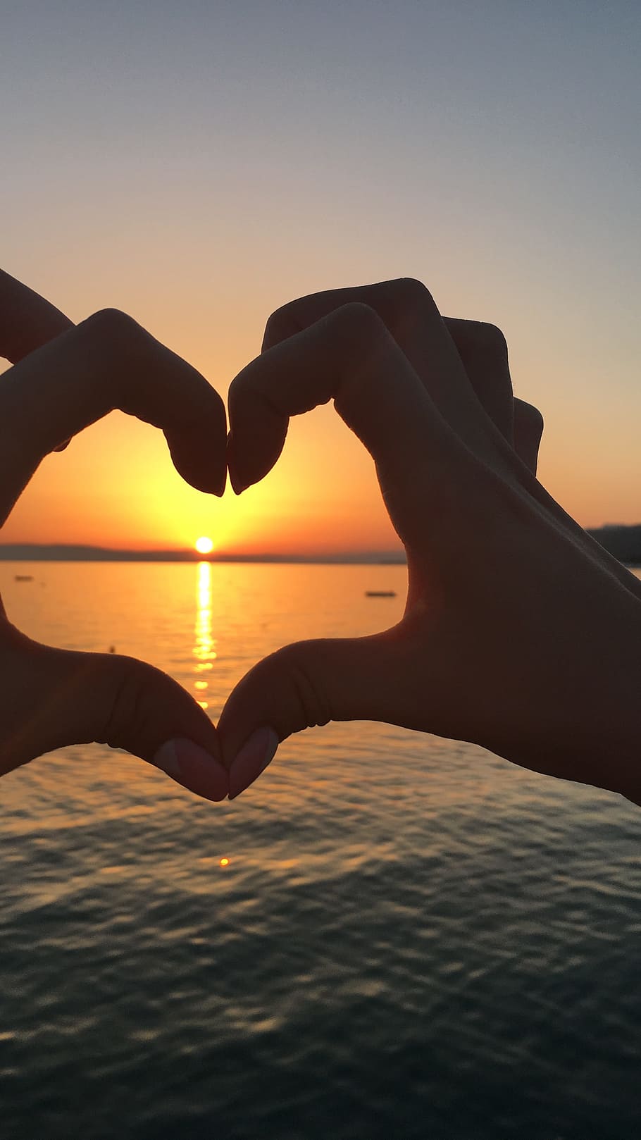 sunset, sea, vacation, summer, evening, sky, horizon, human hand HD wallpaper