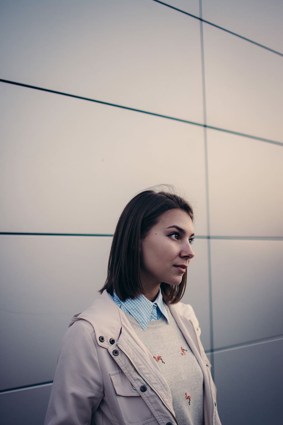 woman in beige jacket standing near wall, women, people, one Person HD wallpaper