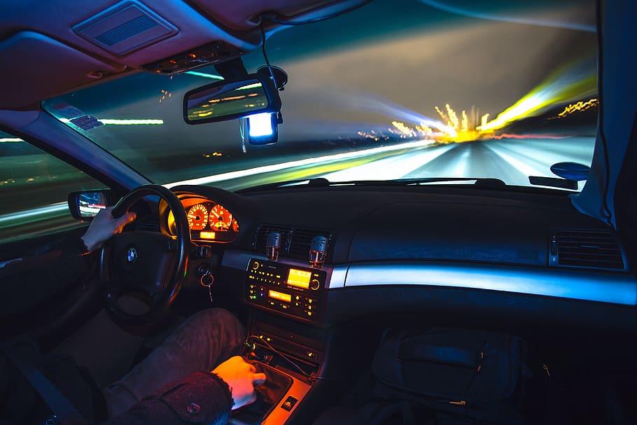 close-up photo of man riding on BMW car, driving, motion, blur HD wallpaper