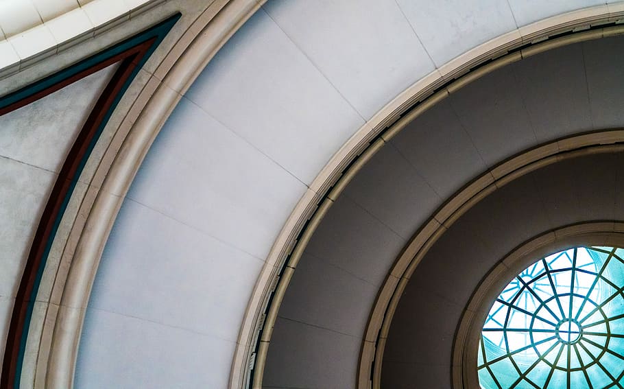 low angle photo of dome glass ceiling, white and beige ceiling