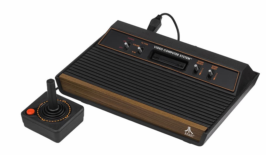 brown and black Atari with joystick, video game console, play