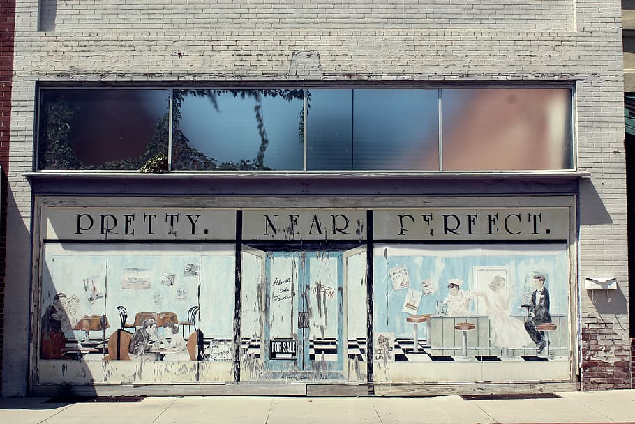 Pretty Near Perfect storefront, grey concrete structure beside pathway HD wallpaper