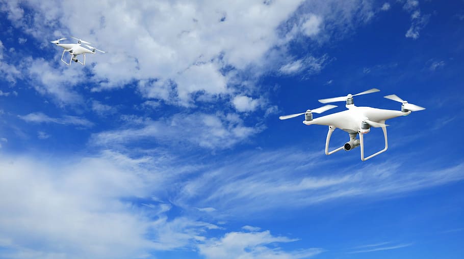 two white quadcopters, phantom p4, dji, drones, uav, aerial HD wallpaper
