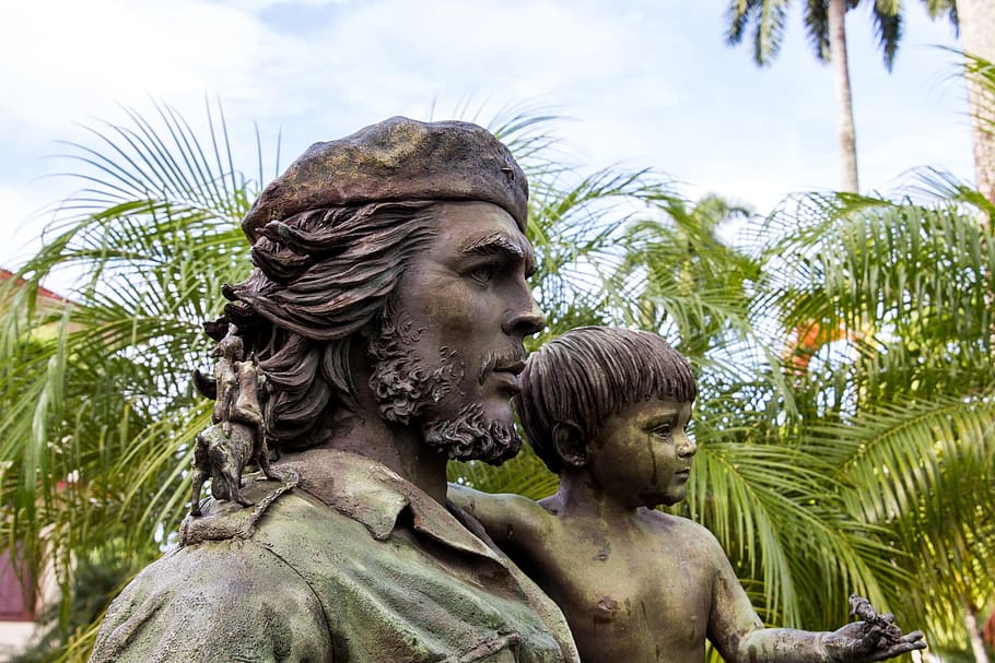 man carrying boy statue near coconut trees during daytime, Cuba, HD wallpaper