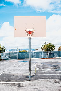 shallow focus of white and red basketball hoop, white and brown basketball hoop cleared during daytime HD wallpaper