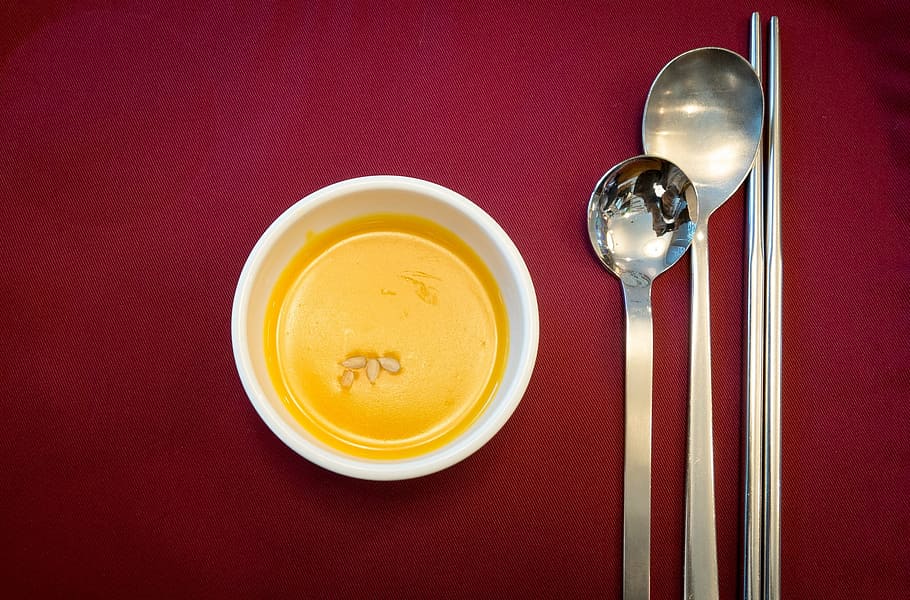 round white ceramic bowl with silver-colored spoon, table, soup HD wallpaper