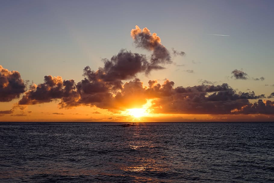 skyline during golden hour, sunset, scene, ocean, sunrise, water HD wallpaper