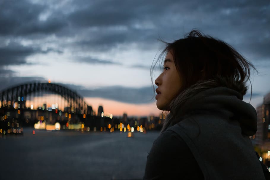 selective focus photography of woman wear hoodie, dusk, twilight, HD wallpaper