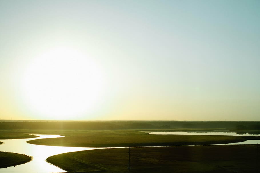 aerial view of lake and green fields under blue sky, swamp HD wallpaper