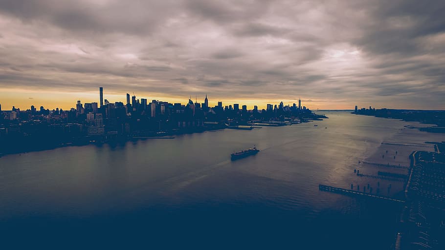 HUDSON WAY, aerial view of high rise buildings and body of water during sunset HD wallpaper