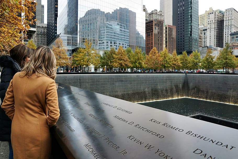 two women standing on One World Trade Center Ground Zero, new york