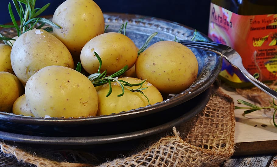 potatoes on platter, vegetables, thyme, oil, olive oil, salt