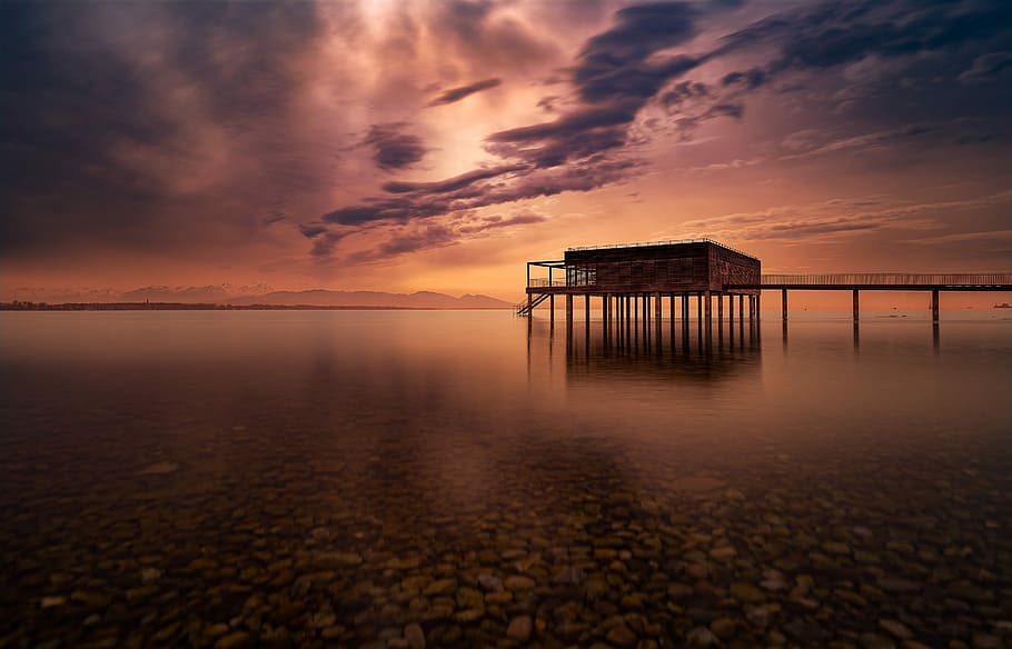 building on body of water, sunset, waters, lake, dusk, nature HD wallpaper