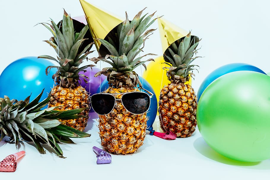 several pineapples at a party, Celebration, tropical, colorful