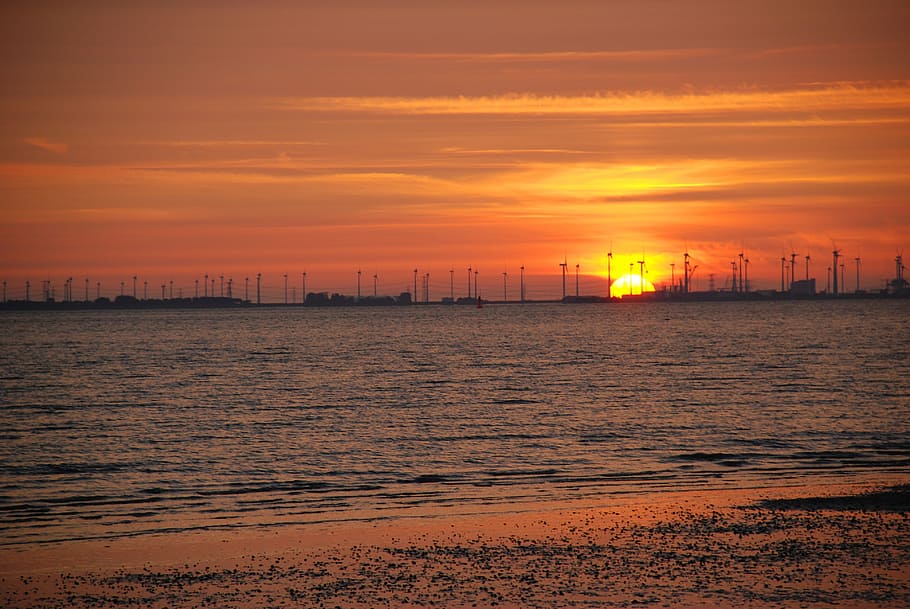 sunset, afterglow, beach, coast, emden, knock, sky, water, orange color HD wallpaper