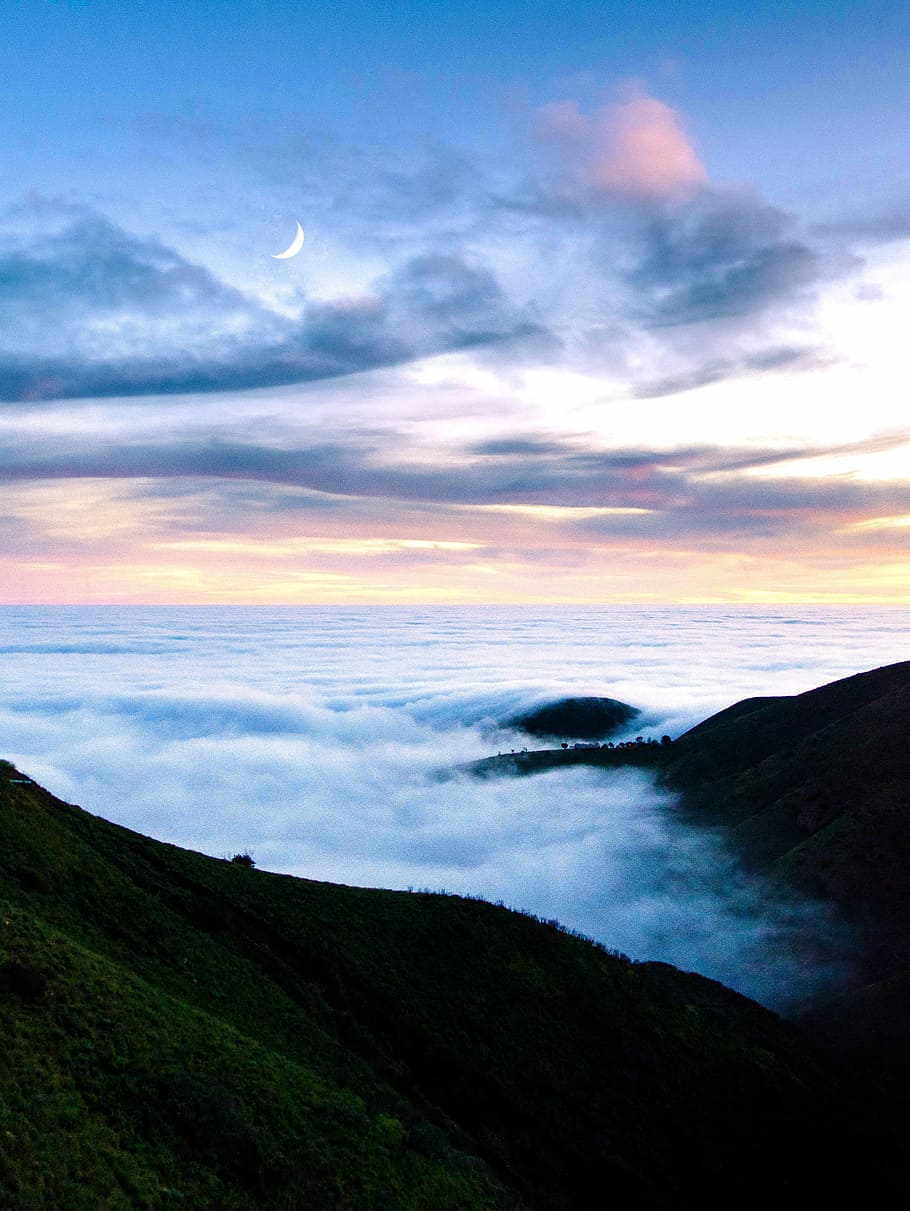 body of water over the horizon, landscape photography of mountain and sea of clouds HD wallpaper