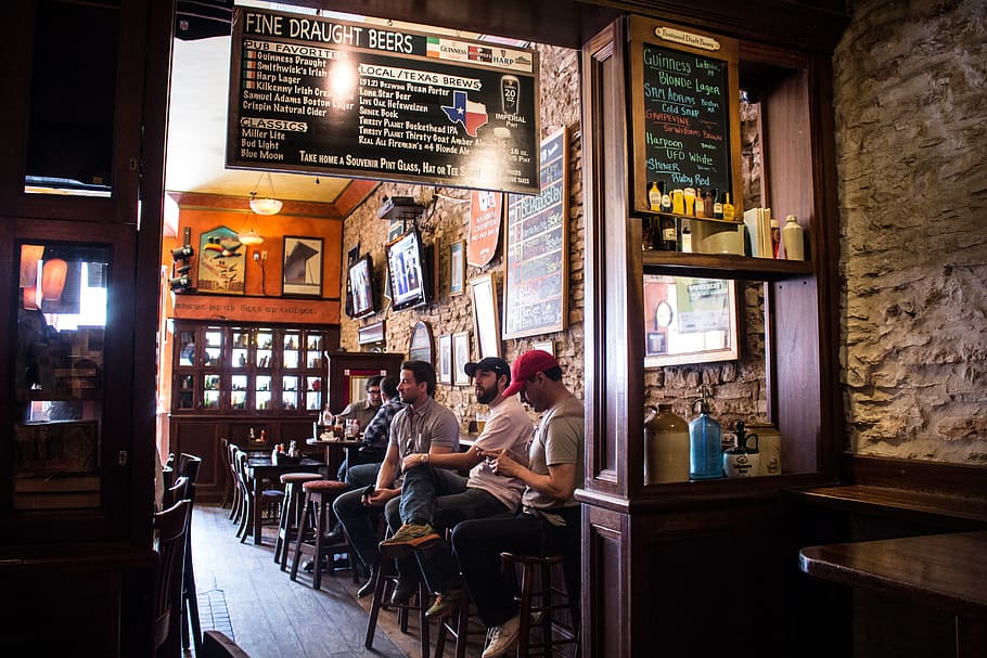 people, men, bar, store, shop, table, chairs, drink, sitting HD wallpaper