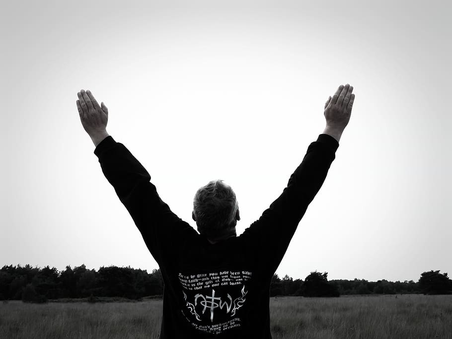 grayscale photo of man raising his arms, worship, god, jesus