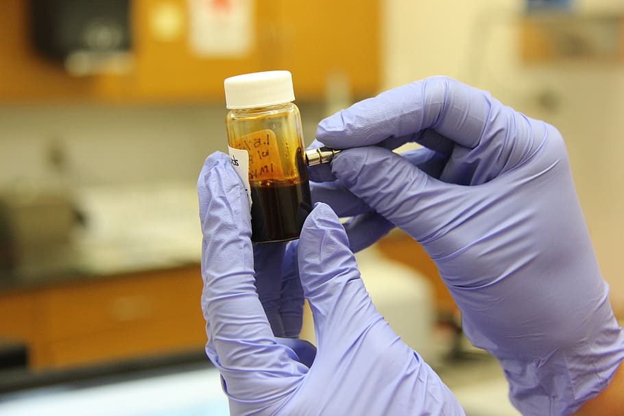 person's hand holding clear laboratory tube, research, science HD wallpaper