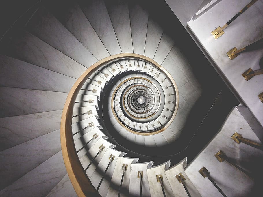 photo of spiral white stairs, aerial photography of spiral stairs