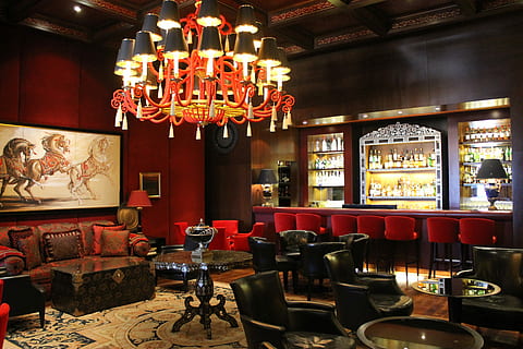 lighted chandelier inside bar, room with chairs, tables, and chandelier HD wallpaper