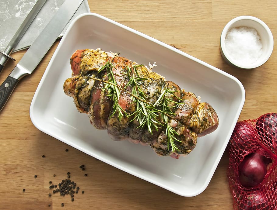 pork belly dish, roasted chicken on tray beside knife, dinner HD wallpaper