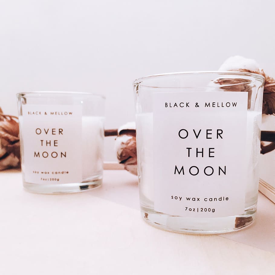 selective focus photographyof two Over the Moon votive candles HD wallpaper