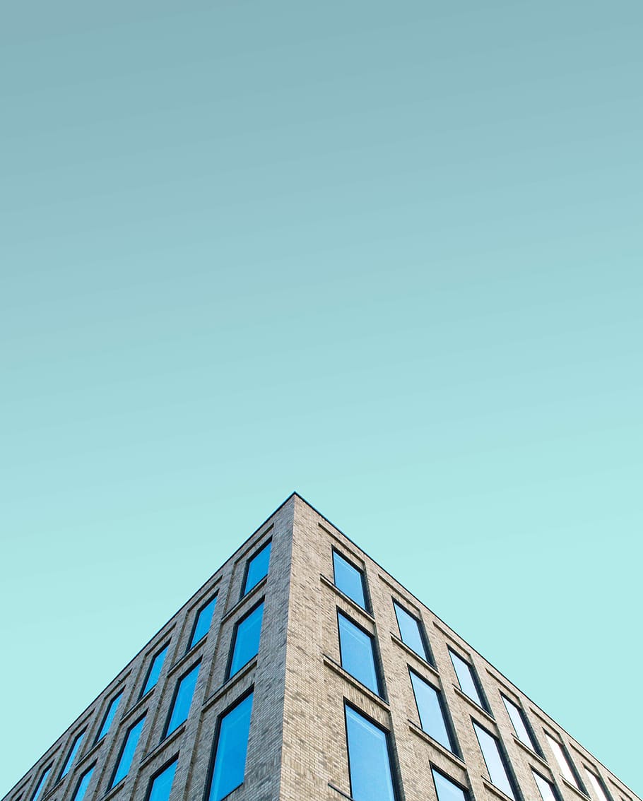 low angle photography of brown building structrure, grey concrete building HD wallpaper