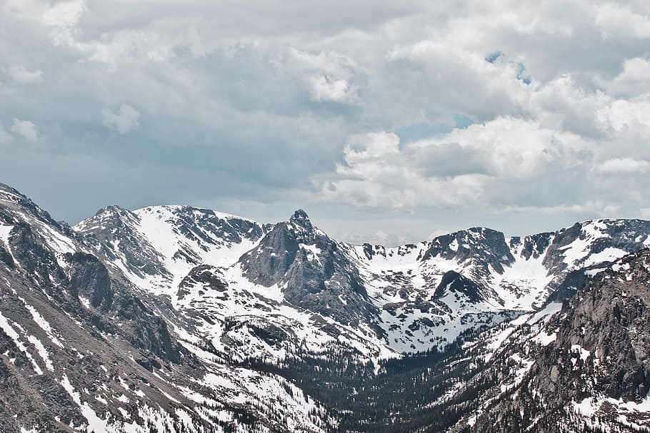 snow covered mountains under cloudy sky, bird's-eye view photography of snow mountain HD wallpaper