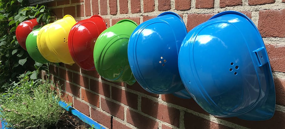 hard helmet hang on wall, yellow, red, blue, green, construction helmets HD wallpaper