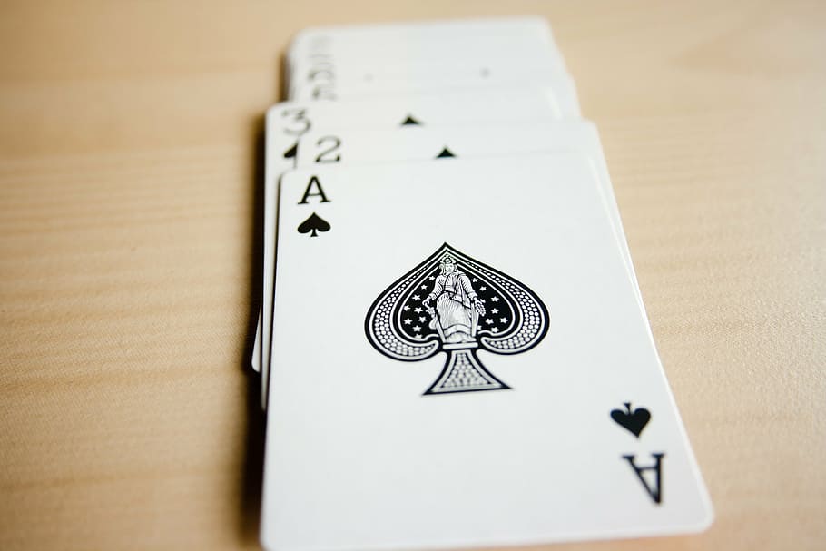 selective focus photography of playing cards, spades, card deck