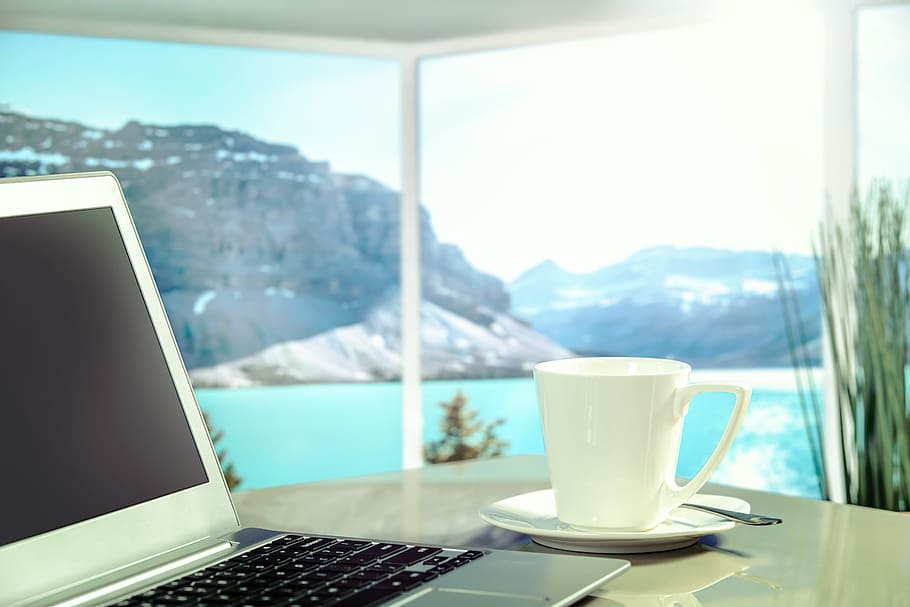 photography of laptop computer beside mug on top of table, apple HD wallpaper