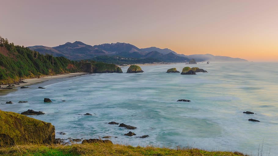 sea near mountain, beach, coast, dawn, dusk, mountains, nature HD wallpaper