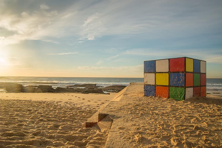 selective focus photography of 3x3 Rubik's cube on beach sand, HD wallpaper