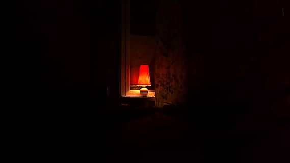 white and brown table lamp on top of surface, orange table lamp lit inside the dark room HD wallpaper