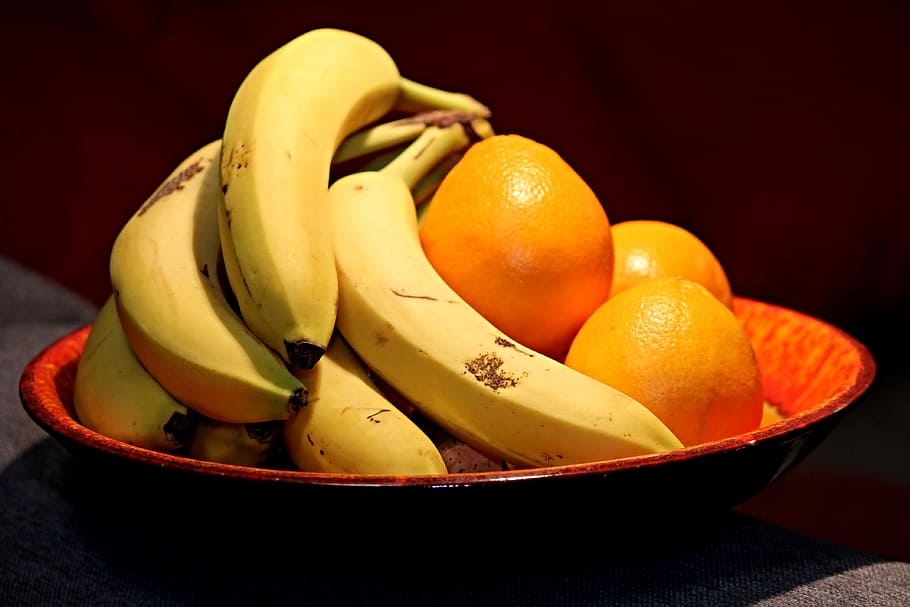 assorted fruits in round black ceramic bowl, bananas, oranges HD wallpaper