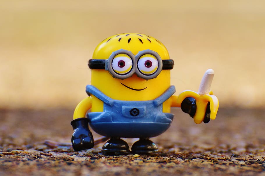 selective focus photography of Minion holding banana toy, funny, HD wallpaper
